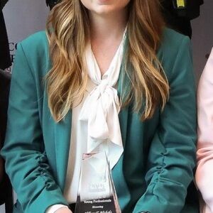 Any Taylor work wear shirt. Cream color with tie knot around neck. Chiffon